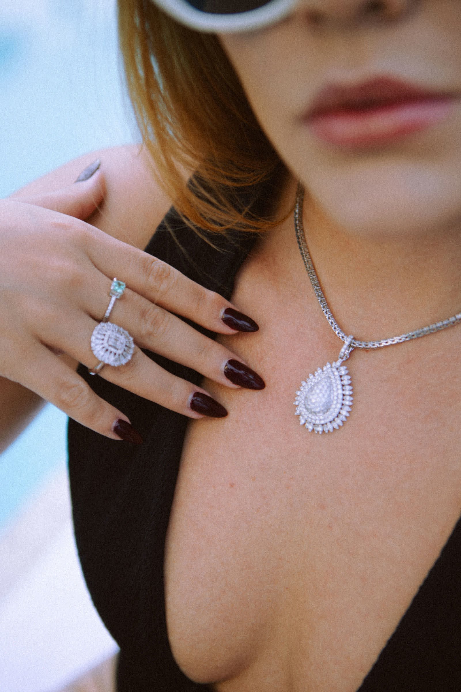 Eternal Drop Necklace — A tiered drop pendant on a diamond riviera.